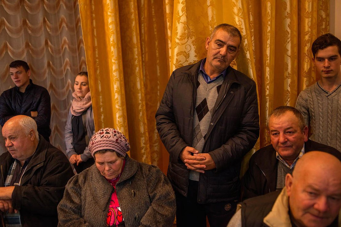 Residents of the Razeni village, 20 km from Chisinau, at a meeting for pro-EU candidate Maia Sandu