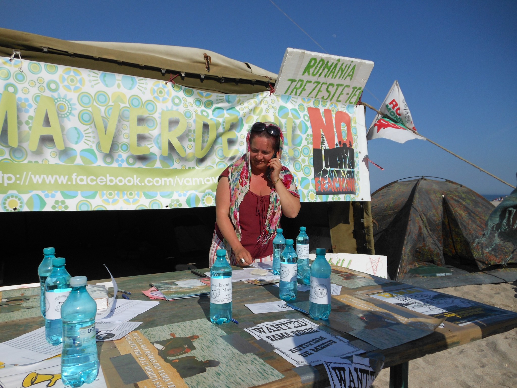In the seaside village of Vama Veche, Romania, Rodica Cruceanu collects signatures to push for a parliamentary commission to investigate the environmental impact of fracking. (Image: Dimiter Kenarov)