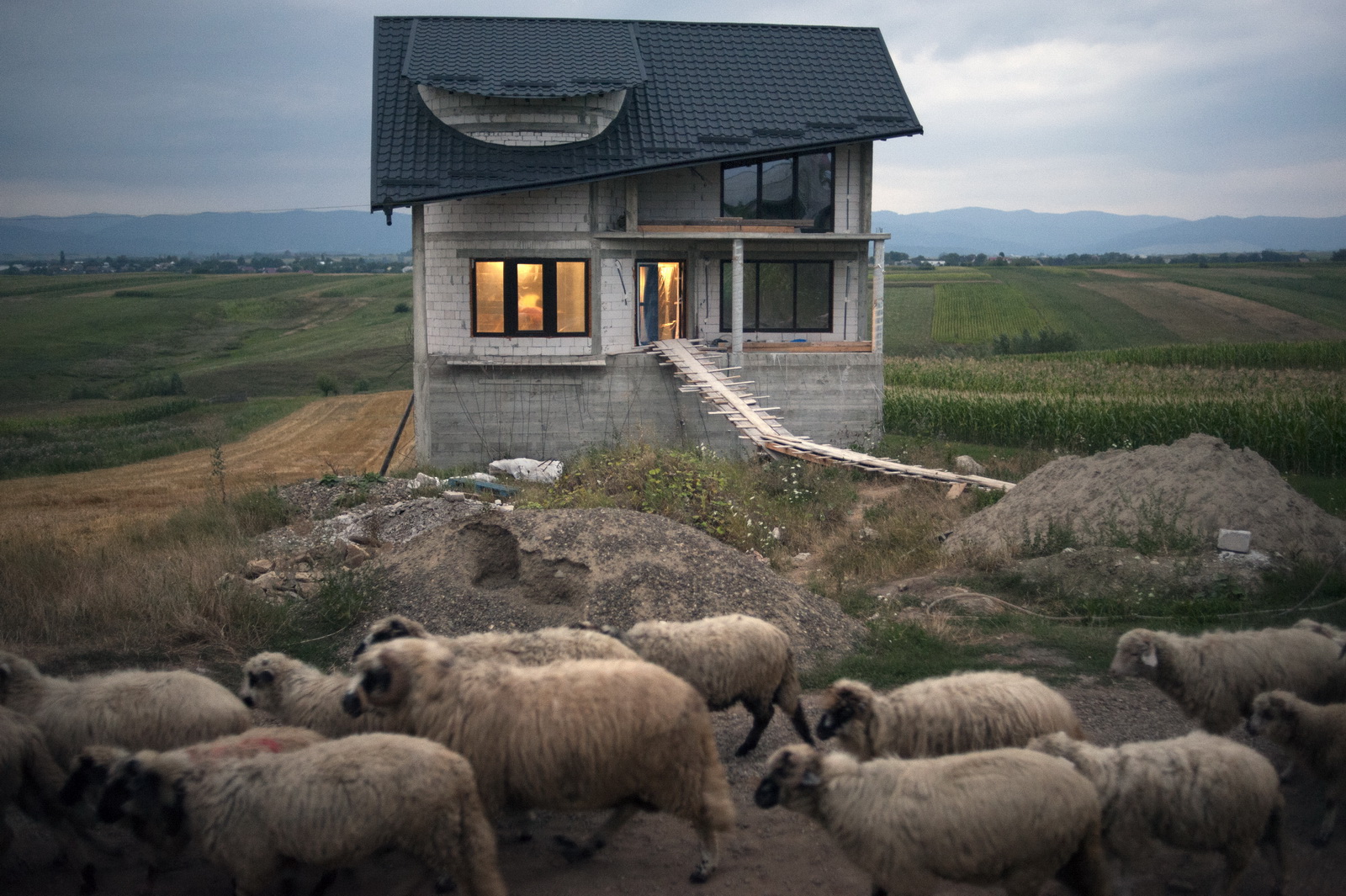 Many new houses remain unfinished for years (photo Â© Petrut Calinescu)
