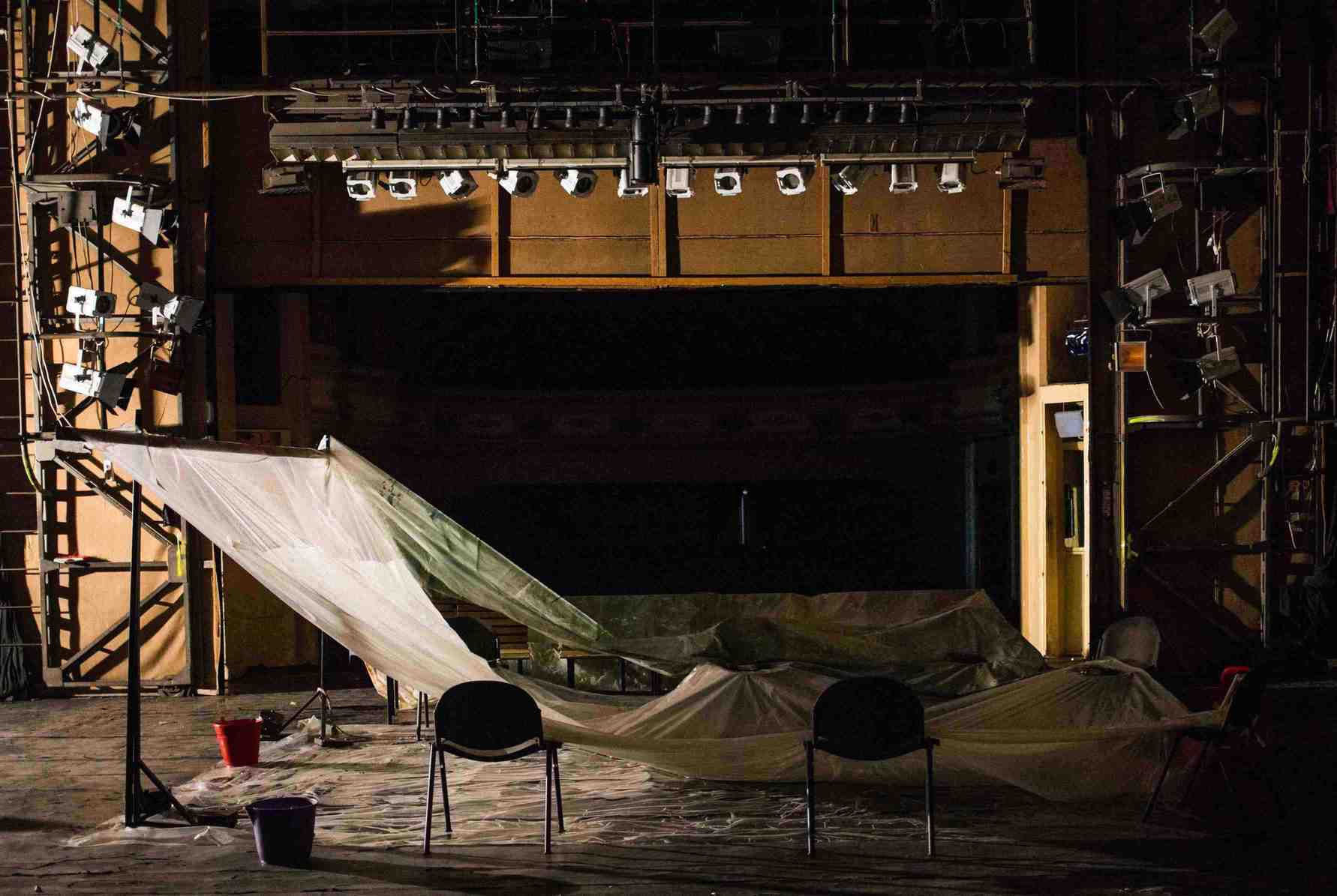 Over six decades of Yiddish theater, the stage is now hosting a tarpaulin to catch leaking water from a busted roof