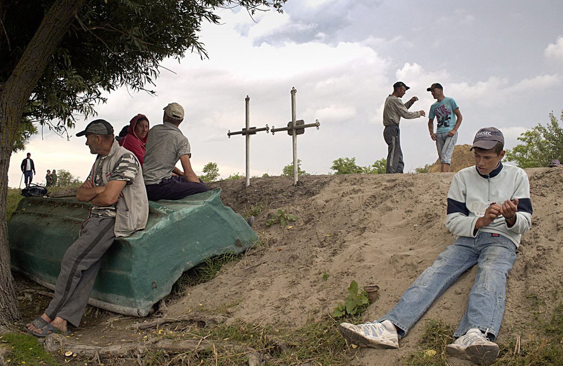 Villagers wait to participate as extras on a film set. Letea, Romania, 2013.